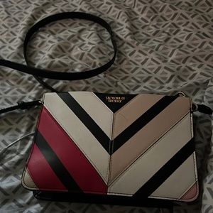 Selling a Victoria’s Secret purse that has barely been used.